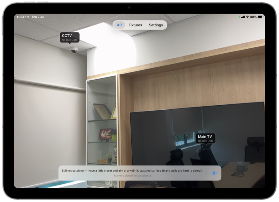 Status-colored AR markers over fixtures in Husvarde on iPad